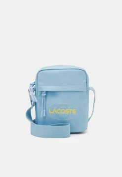 Lacoste UNISEX EXCLUSIVE - Sac Bandoulière - Light Blue