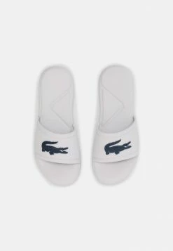 Lacoste SLIDE UNISEX - Sandales De Bain - White/dark Blue -Lacoste Soldes Magasin 0f6f6a3addbc413684d4c660f4b7e76b