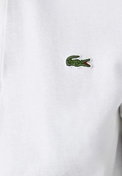 Lacoste KORTE MOUW - Polo - Blanc -Lacoste Soldes Magasin 14f2a99d120b4705b0abfe5a5112fbf4
