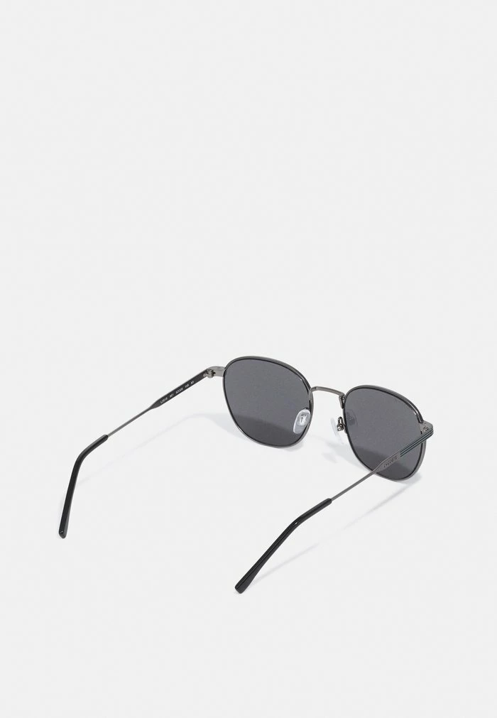 Lacoste UNISEX - Lunettes De Soleil - Semimatte Dark Gunmetal 2 Lacoste UNISEX - Lunettes De Soleil - Semimatte Dark Gunmetal – Image 2