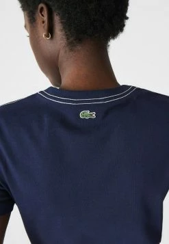 LACOSTE FEMME - T-shirt Imprimé - Bleu Marine Blanc -Lacoste Soldes Magasin 3ada34cf313b43c5aefbcad7a053faff