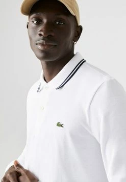 LACOSTE POLO ML - Polo - Blanc Bleu Marine -Lacoste Soldes Magasin 4b0f117c62ed4fc5807217a838d61a03