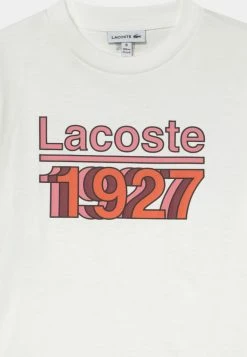 Lacoste TEE TURTLE NECK 1927 - T-shirt Imprimé - Farine/multi-coloured -Lacoste Soldes Magasin 4e78e7cbfd184981ac981a5353bb8b58