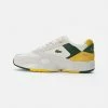 Lacoste STORM - Baskets Basses - Off White/yellow