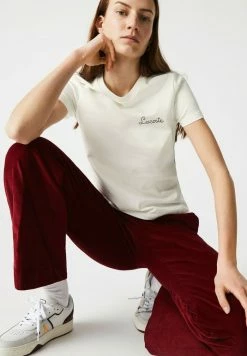 LACOSTE FEMME - T-shirt Imprimé - Blanc / Vert -Lacoste Soldes Magasin 80e25f739f4d4c41be611fed16781bcf