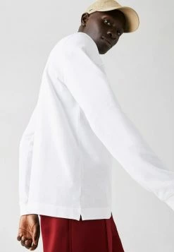 LACOSTE POLO ML - Polo - Blanc Bleu Marine -Lacoste Soldes Magasin 93c7a5f4ce3c48c59ab90e82fd9940df
